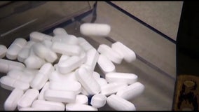 Reaction to tentative settlement with pharmaceutical firm over opioid epidemic mixed