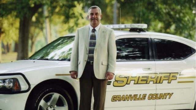 North Carolina sheriff indicted in plot to kill former deputy over racially charged recording