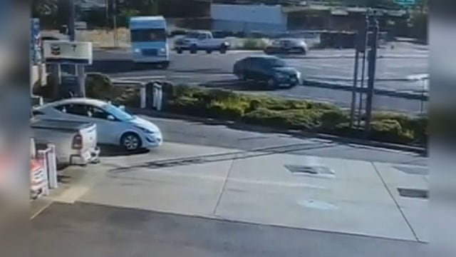 Surveillance video shows man falling out of delivery truck near California gas station