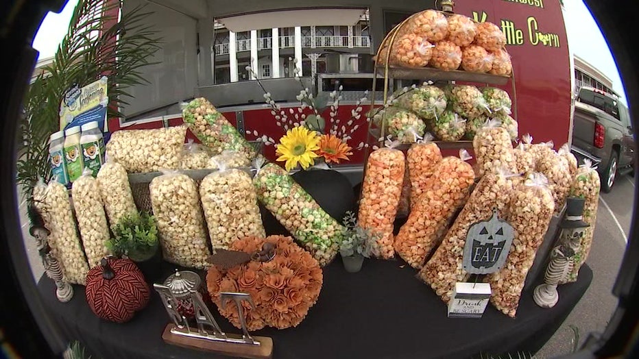 A photo showing an assortment of bagged kettle corn on top of a table