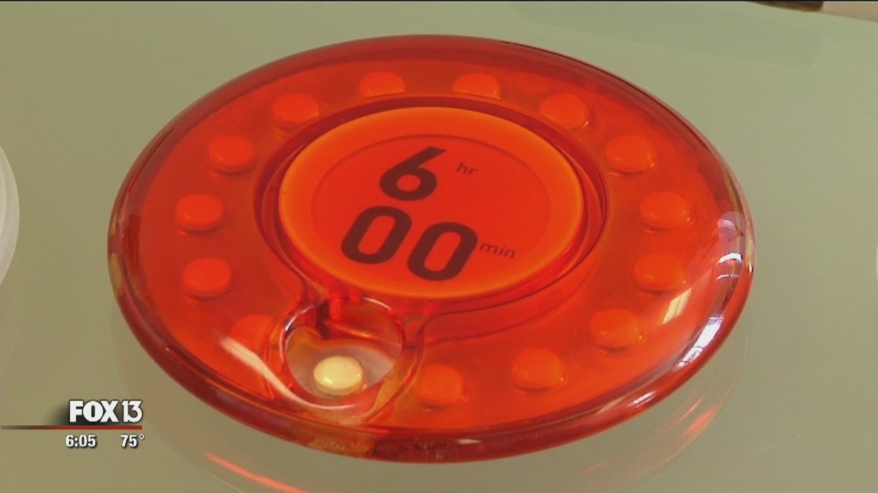 Pill dispenser with lock, timer could prevent opiate addiction