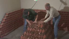 Valley man cashes in more than 1 million pennies that were used to build giant pyramid