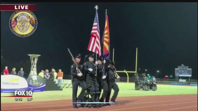 Peoria officer stands for first time in 14 years since left paralyzed after being shot