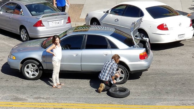 Act of kindness: Homeless man changes tire for woman stranded in middle of street