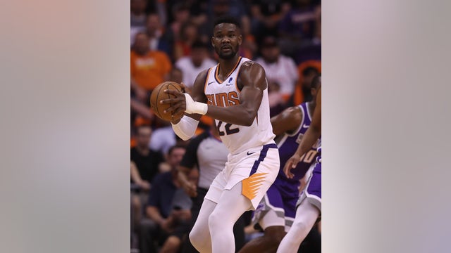 Suns center Deandre Ayton suspended for 25 games by NBA