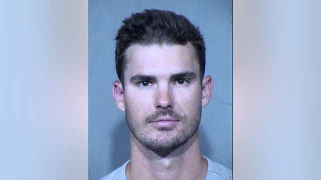 San Diego Padres pitcher arrested, accused of crawling through doggy door of Peoria home