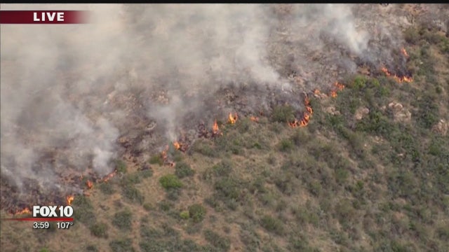 Weather conditions complicating efforts to contain Woodbury Fire