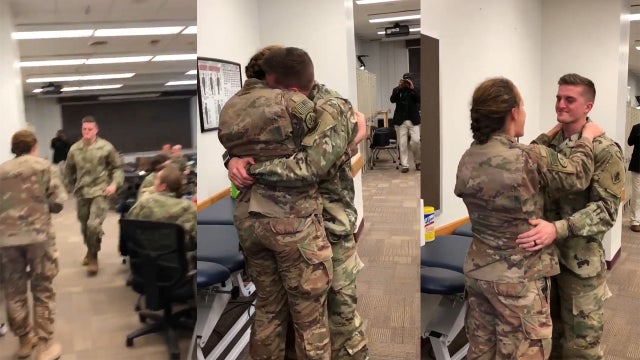 Emotional embrace: Military couple's surprise reunion caught on camera