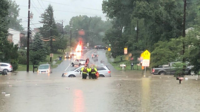 Flooded roadways, stranded vehicles as heavy rains batter the DC region