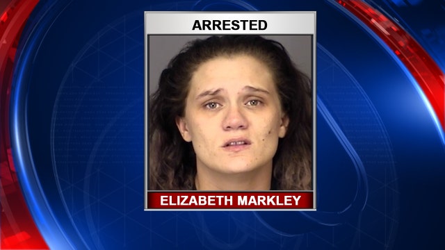 Woman charged with child neglect after 9-year-old daughter's death