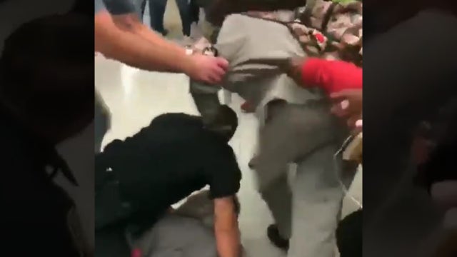 WATCH: Florida cop making arrest is kneed, kicked in face by student