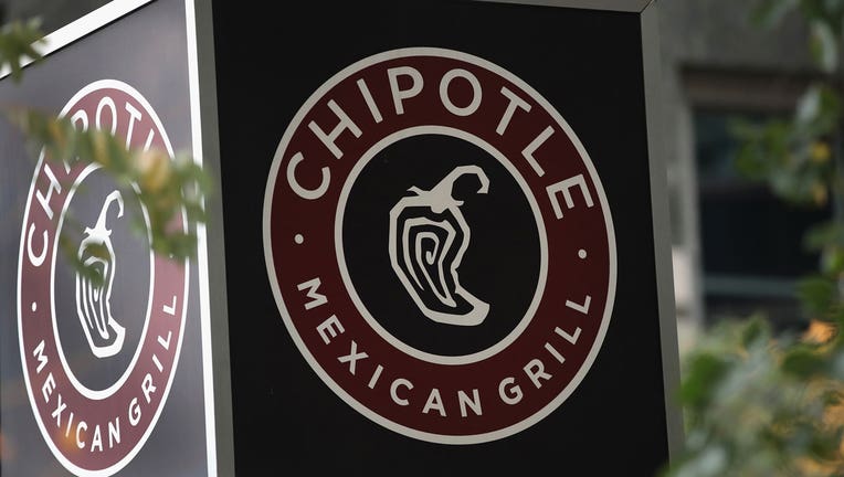The sign for a Chipotle restaurant is shown in a file photo. (Photo by Scott Olson/Getty Images)