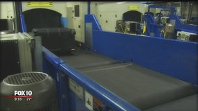 Behind the scenes of screening checked luggage at Sky Harbor