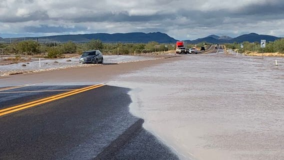 Driver rescued after car gets stuck in flooded wash along Carefree Highway