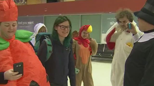 Thanksgiving surprise: Family picks up daughter and her new boyfriend in costume