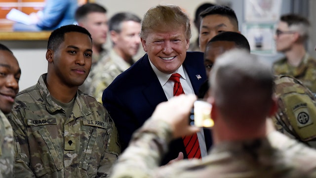 Trump makes surprise trip to visit troops in Afghanistan on Thanksgiving