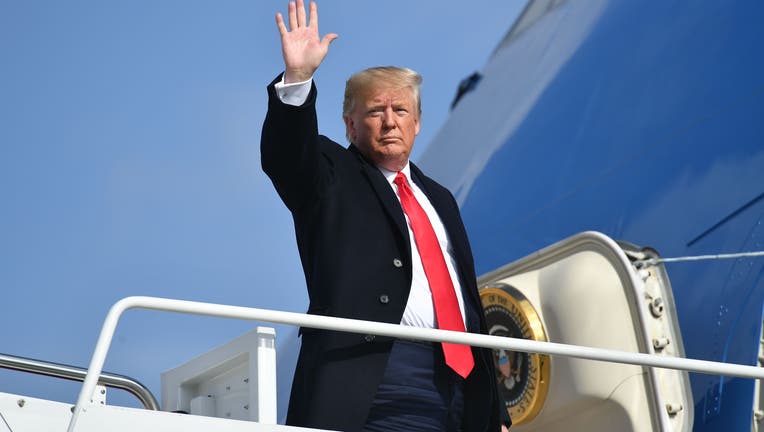 US President Donald Trump makes his way to board Air Force One before departing from Andrews Air Force Base in Maryland on November 20, 2019. - President Trump is heading to Austin to tour an Apple computer manufacturing facility. (Photo by MANDEL NGAN / AFP) (Photo by MANDEL NGAN/AFP via Getty Images)