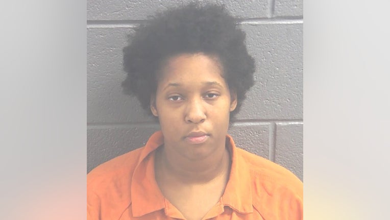 Yasmine Burton, 21, faces a felony animal cruelty charge in addition to grand larceny.