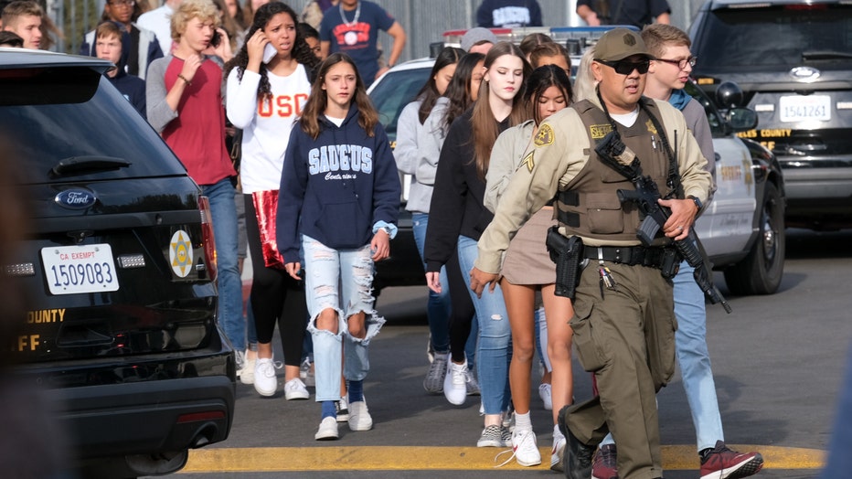 GettyImages-1-Saugus-High-School-shooting-hug.jpg