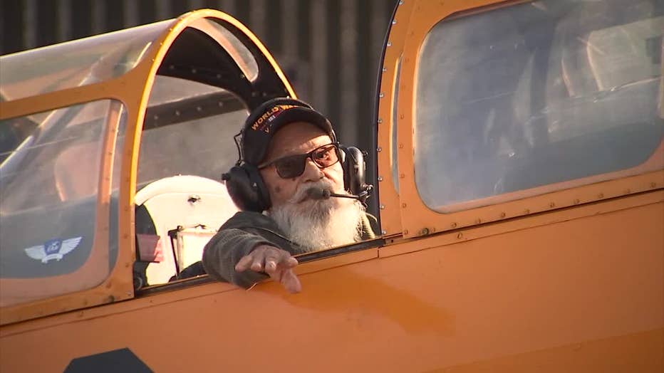 Veteran flies in World War II era aircraft in surprise for 100th