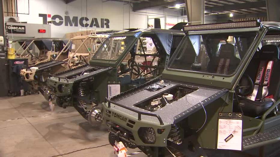 Photo of two unfinished Tomcars in a factory
