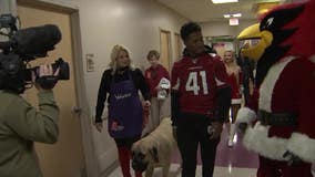 Kenyan Drake, other Arizona Cardinals players visit kids at Phoenix Children's Hospital to spread holiday joy