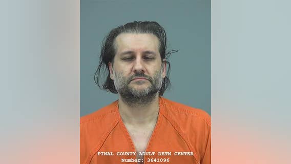 Police: Dog's death leads to discovery of child porn, weapons in Maricopa man's home