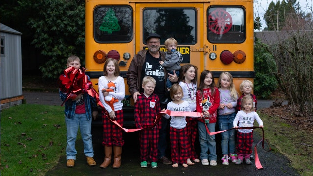 'Grandfather Express': Man surprises grandchildren with bus to take them to school each morning