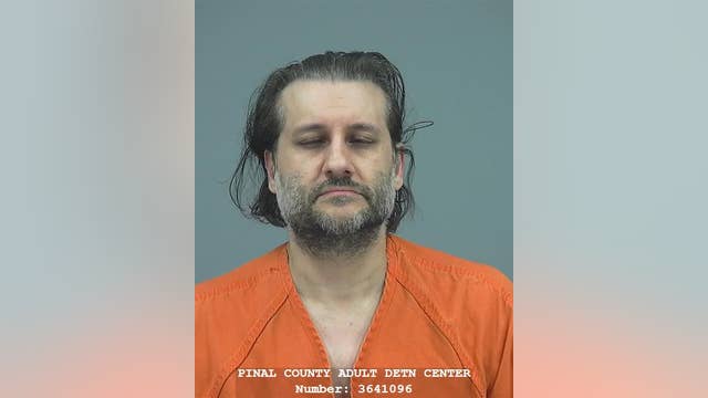 Police: Dog's death leads to discovery of child porn, weapons in Maricopa man's home