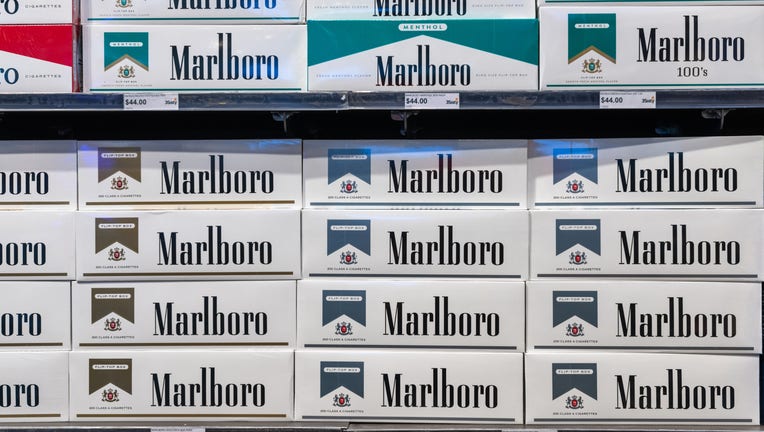 ORLANDO, FLORIDA, UNITED STATES - 2019/07/19: Pattern form by the word 'Marlboro' which is seen in boxes of cigarettes exhibited in a store shelf. Marlboro is an American brand of cigarettes, currently owned and manufactured by Philip Morris USA. (Photo by Roberto Machado Noa/LightRocket via Getty Images)