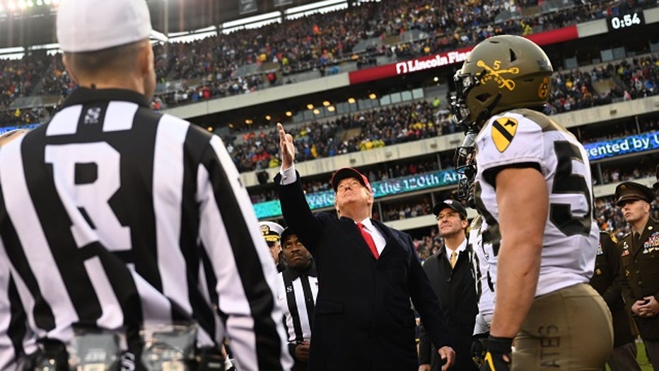 GettyImages-Donald-Trump-coin-toss-Army-Navy-2019.jpg