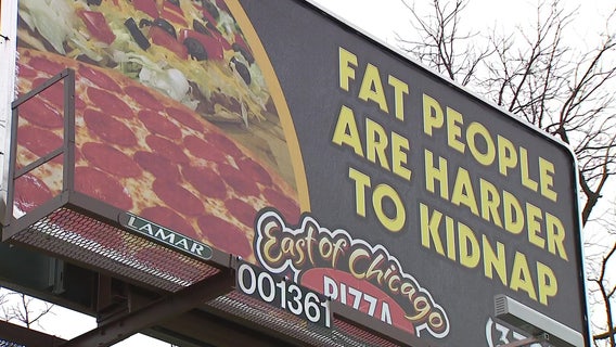 Ohio pizza shop's 'fat people are harder to kidnap' billboard being taken down after customer complaint