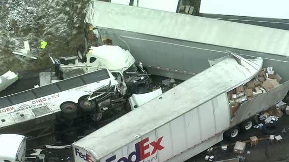 Investigators say bus passed truck before Turnpike wreck killing 5