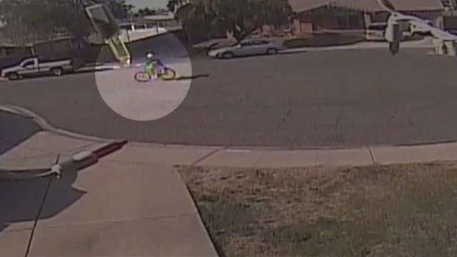Person on bike steals wheelchair from another person's driveway