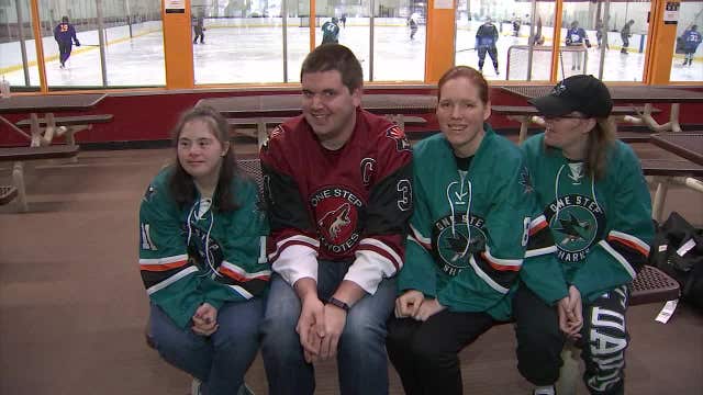 Valley firefighters compete against police at AZ Ice in special hockey game for adults with disabilities