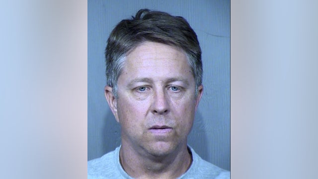 Police: Man arrested in connection with bank robbery where dye pack exploded, left pink cloud trail