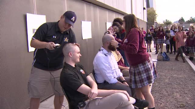 Students shave heads in solidarity with friend who's battling cancer