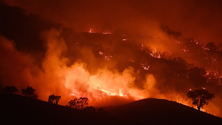 MOUNT ADRAH, AUSTRALIA - JANUARY 10: General view of the Dunn Road fire on January 10, 2020 in Mount Adrah, Australia. NSW is bracing for severe fire conditions, with high temperatures and strong winds forecast across the state. There are about 135 fires burning in NSW, 50 of which are uncontained. 20 people have died in the bushfires across Australia in recent weeks, including three volunteer firefighters. About 1995 homes have been destroyed and another 816 have been damaged across NSW. (Photo by Sam Mooy/Getty Images)