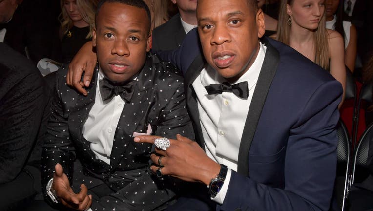 LOS ANGELES, CA - FEBRUARY 12: Hip Hop Artists Yo Gotti and Jay-Z during The 59th GRAMMY Awards at STAPLES Center on February 12, 2017 in Los Angeles, California. (Photo by Lester Cohen/Getty Images for NARAS)