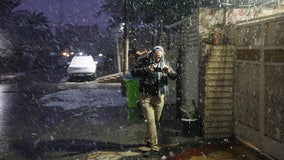 Iraqis wake up to snow for first time in over a decade