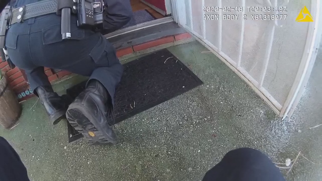 Body cam: California police officer saves man from burning home