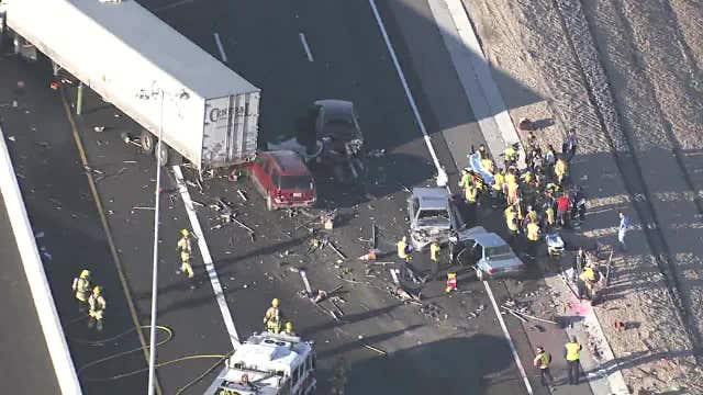 8 people hurt following multi-car crash involving hazardous materials on Loop 202