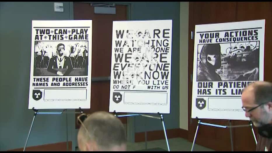 Neo-Nazi posters on display during a law enforcement news conference in February 2020