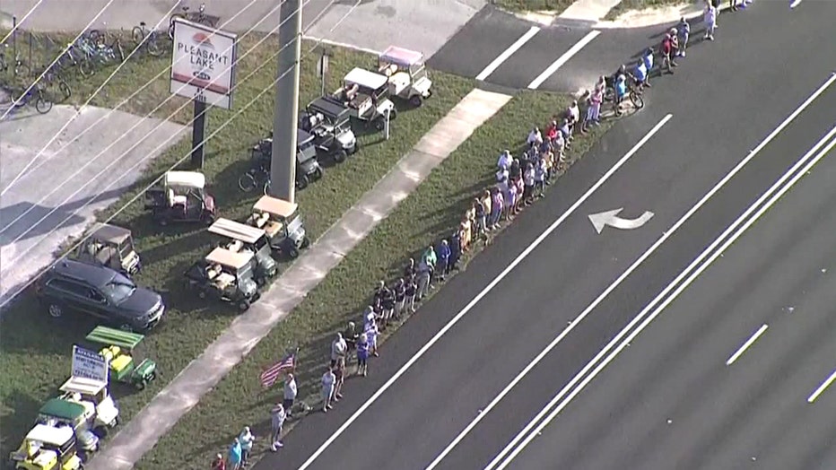 people-lined-up-on-procession-route.jpg