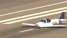 Small plane missing tire, landing gear makes emergency belly-landing at Goodyear Airport