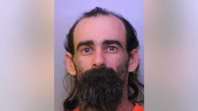 Cops say man killed sleeping couple, buried bodies in swamp