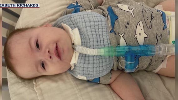 Mother visits 18-month-old son through window as COVID-19 limits visitations