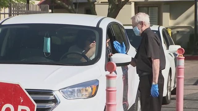 Scottsdale church offers drive-thru holy water for Palm Sunday