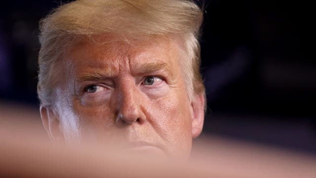 President Trump warns of 'heavy price' if Iran carries 'sneak attack' on US troops in Iraq