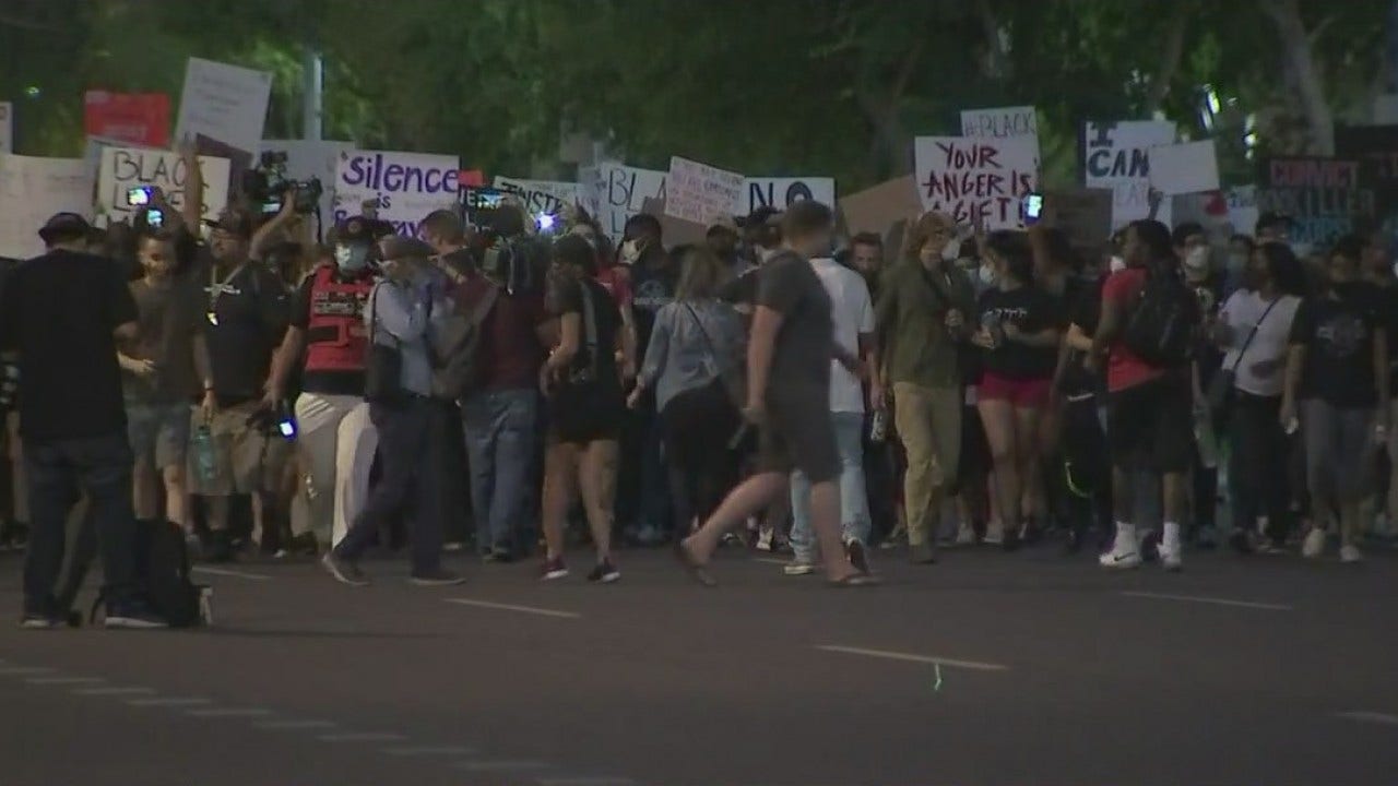 Police fire tear gas at protesters in Downtown Phoenix, witnesses say